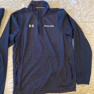 Under armor blue quarter zip. Notre Dame Logo on back and front